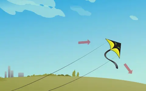 Un cerf-volant jaune et noir s'envole dans un ciel bleu. Une activité manuelle pour s'amuser dehors.